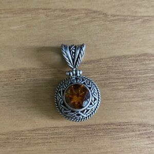 Amber and sterling silver pendant